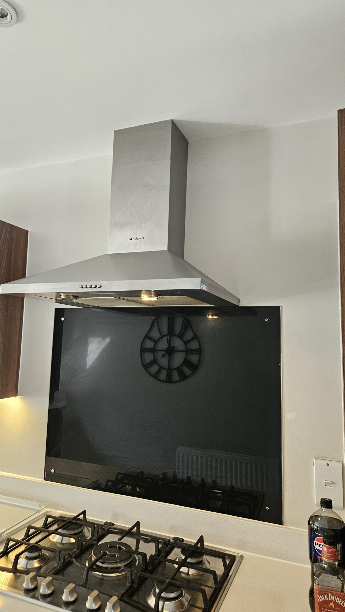 Gas hob and extractor hood, close detail after an end of tenancy clean